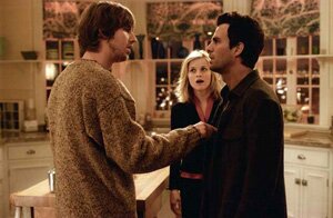 John Heder as Darryl, the guy with a certain psychic ability, explaining things to David (Mark Ruffalo) as Elizabeth (Reese Witherspoon) watches. 